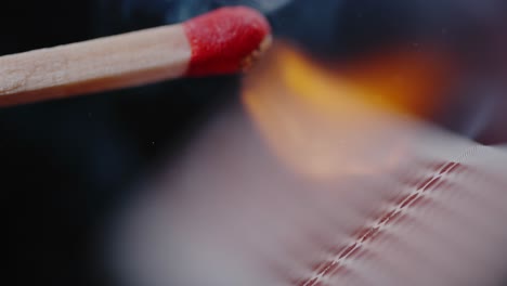 Intense-Flame-Igniting-from-Struck-Match-on-Black-Background