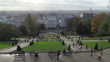 People-Gather-in-Overlook-of-Paris-Near-Square-Louise-Michel