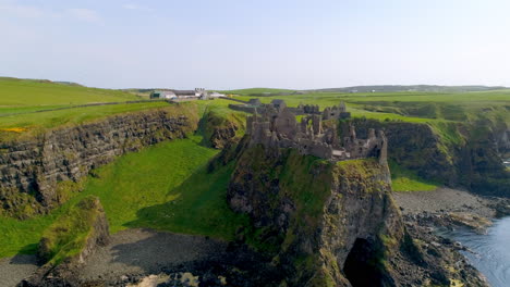 Dunluce-castle-aerial-track-from-right-to-left-above-the-sea