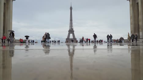 Eiffel-Tower-Image-Casts-Reflection-of-Wet-Ground-on-Trocadero-Square
