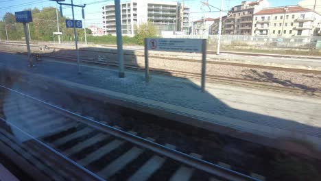 view-of-Padova,-Italy-train-platform-from-inside-the-train