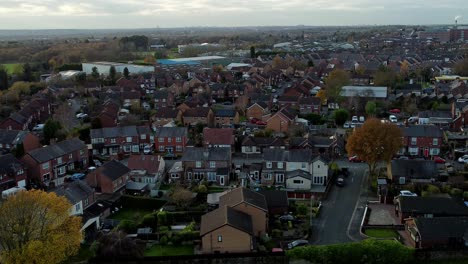 Rainhill-typical-British-suburban-village-in-Merseyside,-England-aerial-view-over-Autumn-residential-council-housing