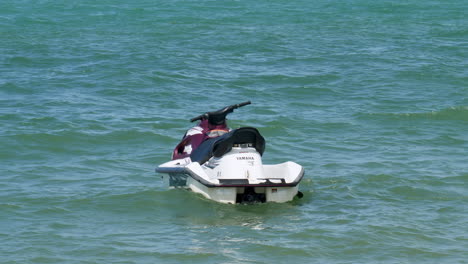 Jetski-rocking-back-and-forth-in-the-shallow-waters-of-Pattaya-beachfront-in-the-province-of-Chonburi-in-Thailand