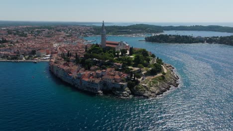 Aerial-view-of-the-croatian-landmark,-old-town-Rovinj-and-the-cathedral-of-St