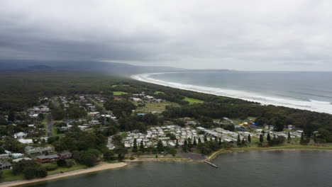 Aerial-drone-shot-around-Shoalhaven-heads-and-caravan-park-on-a-stormy-day-in-south-coast-NSW,-Australia