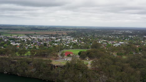 Aerial-drone-shot-around-Nowra-on-a-stormy-day-revealing-the-Shoalhaven-river,-South-coast-NSW-Australia