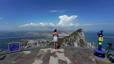 A-woman-at-the-Gibraltar-Cable-Car-Top-Station-overlook-in-Spain