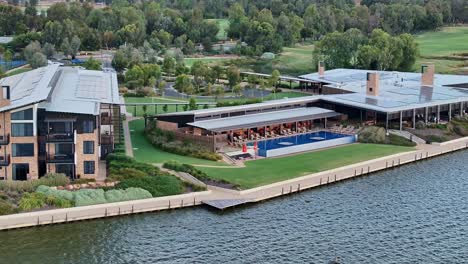 Close-and-low-aerial-view-of-accommodation-and-swimming-pool-at-Sebel-Hotel-in-Yarrawonga
