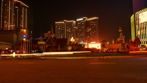 Timelapse-of-cars-at-night-passing-in-front-of-lit-buildings-in-Cambodia