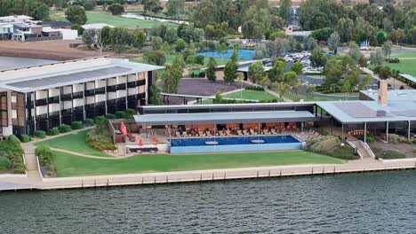Close-and-low-aerial-view-of-swimming-pool-and-outdoor-dining-area-at-the-Sebel-Hotel-in-Yarrawonga