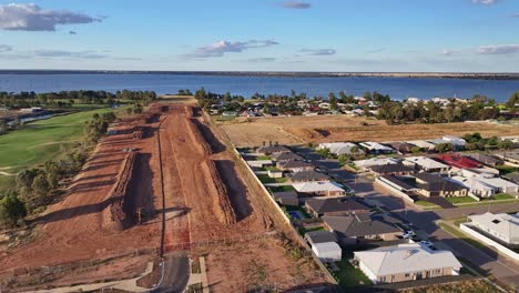 Over-new-homes-and-earth-works-with-Black-Bull-Golf-Course-and-Lake-Mulwala-beyond