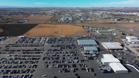 Drone-aerial-view-of-a-large-car-lot-in-Billings-Montana
