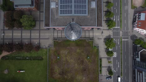 Aerial-top-down-of-public-Building-powered-by-solar-panels-energy,-Kaiserslautern