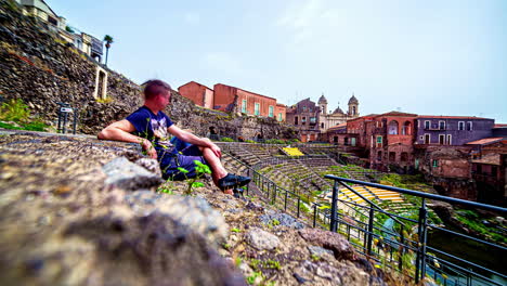 Timelapse-of-a-man-resting-in-the-ruins-of-a-Roman-theatre-in-Sicily