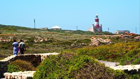 Family-walks-at-Cape-Agulhas-Southern-Tip-Monument-near-iconic-lighthouse