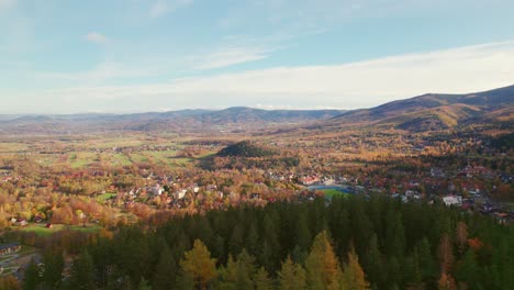 Karpacz,-Poland,-mountain-city-during-autumn,-fly-in-drone-movement