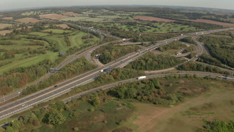 Rising-aerial-slider-shot-over-M25-M11-motorway-road-interchange-Essex