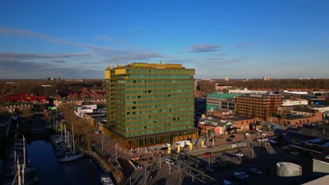 Modern-twin-tower-Holiday-Inn-building-in-traditional-Amsterdam-Noord-residential-aerial