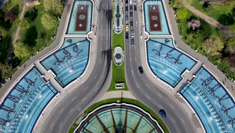 Drone-tilt-up-over-Bucharest-Fountains-reveals-Palace-of-Parliament