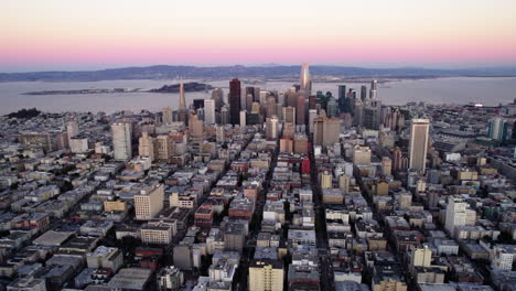 Aerial-view-of-a-vibrant-sky-above-the-cityscape-of-San-Francisco---pull-back,-drone-shot