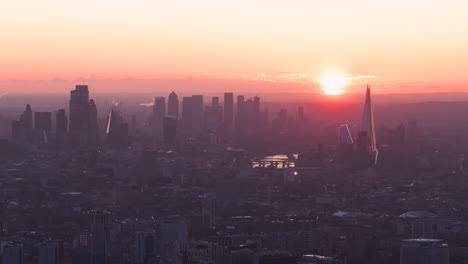 Tight-aerial-shot-of-central-London-at-sunrise
