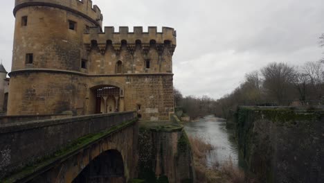 The-German's-Gate-castle-towers-over-the-Seille-River-in-modern-France