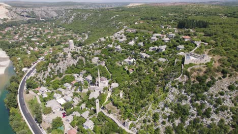 Aerial-flyover-view-of-Počitelj-village,-Bosnia-and-Herzegovina