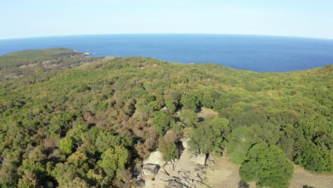Tilting-drone-shot-showing-the-expanse-of-the-ancient-prehistoric-site-of-Beglik-Tash-and-the-Black-Sea-in-Bulgaria