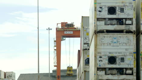 general-shot-of-unloading-cargo-containers-at-a-port,-customs