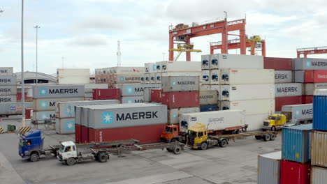 panoramic-shot-of-containers-at-customs,-drone