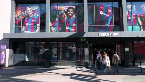 People-visit-Barcelona´s-football-stadium-facility,-Spotify-Camp-Nou,-and-its-official-merchandise-store-and-museum-as-the-stadium-is-currently-under-construction-and-remodeling-in-Barcelona,-Spain