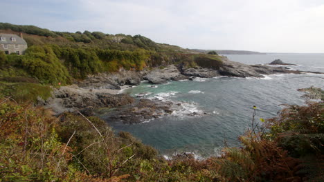 Extra-Wide-shot-of-the-sea-and-rocks-at-Bessy's-Cove,-The-Enys-taken-from-the-Coastal-path,-cornwall