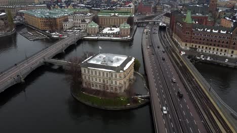 Aerial-establishing-view-of-Stockholm-city-center-with-large-old-brown-buildings