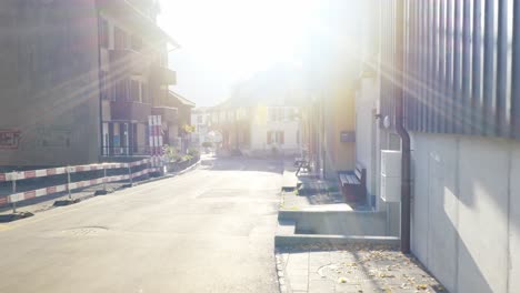 Interlaken-Immersive-POV:-Moving-Through-Early-Morning-City-Streets-In-Switzerland,-Europe,-Walking-|-Moving-Into-Heavenly-Bright-Light-in-Village