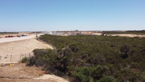 Dolly-Right-Shot-Over-Bushland-Near-Site-Of-New-Alkimos-Station-Building-Works