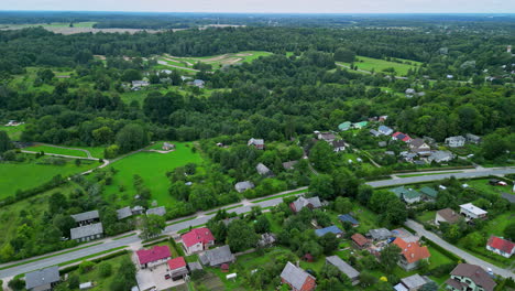 An-Aerial-View-Of-A-Neighbourhood-Located-At-A-Green-Rustic-Environment-With-Groves