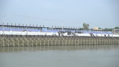 To-use-the-river-water,-such-lock-gates-are-installed-at-the-mouth-of-the-river-so-that-the-river-water-can-be-trapped-and-used-for-agricultural-purposes-in-summer