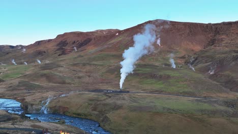 Aerial-View-Of-Steaming-Hot-Springs-Next-To-Hveragerdi-Town-In-South-Iceland---Drone-Shot