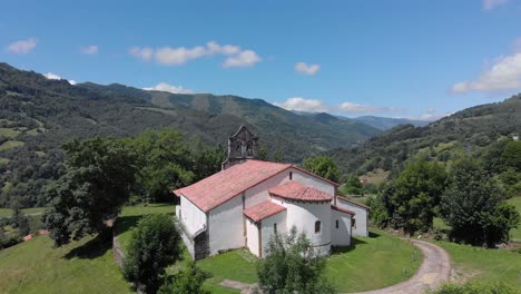 Aerial-view-The-church-of-San-Vicente-de-Serrapio-is-a-temple-of-the-Asturian-council-of-Aller,-Spain