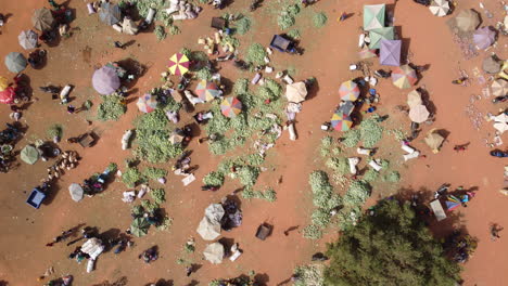 Aerial-video-of-a-market-area-where-people-shop-in-Burkina-Faso-Africa