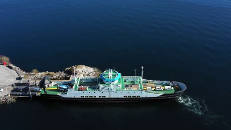 The-car-ferry-MF-"Ivar-Aasen"-loads-cars-going-across-the-fjord