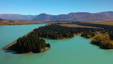 Scenic-aerial-flying-over-Lake-Pukaki,-New-Zealand's-South-Island