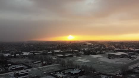 Epic-aerial-view-of-sunrise-at-a-European-town-in-winter