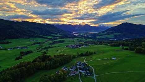Establish-aerial-view-at-sunset-sky-of-hills-near-Attersee-Lake-in-Austria