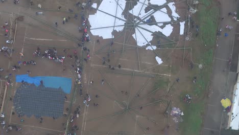 Big-kite-frames-almost-ready-for-the-colorfull-paper-at-All-Saint's-Day-In-Sumpango,-aerial