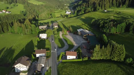 Discover-the-Charm-of-Austrian-Countryside:-4K-Drone-Capture-of-Alpine-Villages,-Majestic-Peaks,-and-Scenic-Drives