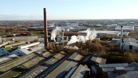 Pilkington-glass-factory-warehouse-buildings-aerial-view-looking-down-at-facility-rooftop