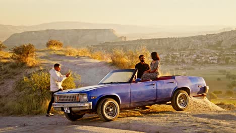 Romantic-couple-sunrise-classsic-car-photo-shoot-epic-landscape