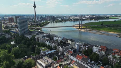 Dusseldorf-city-Skyline-over-the-Rhine-and-Oberkasseler-Bridge