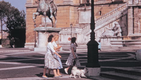 Women-Walking-their-Dog-in-front-of-Palazzo-Senatorio-in-Rome-in-1960s